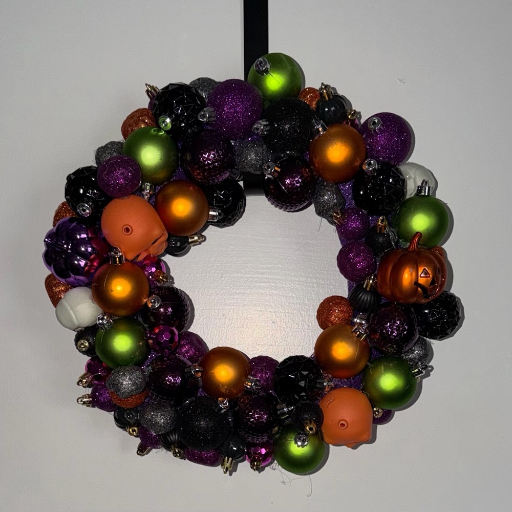 Festive Halloween Wreath with Purple, Orange, and Green Accents